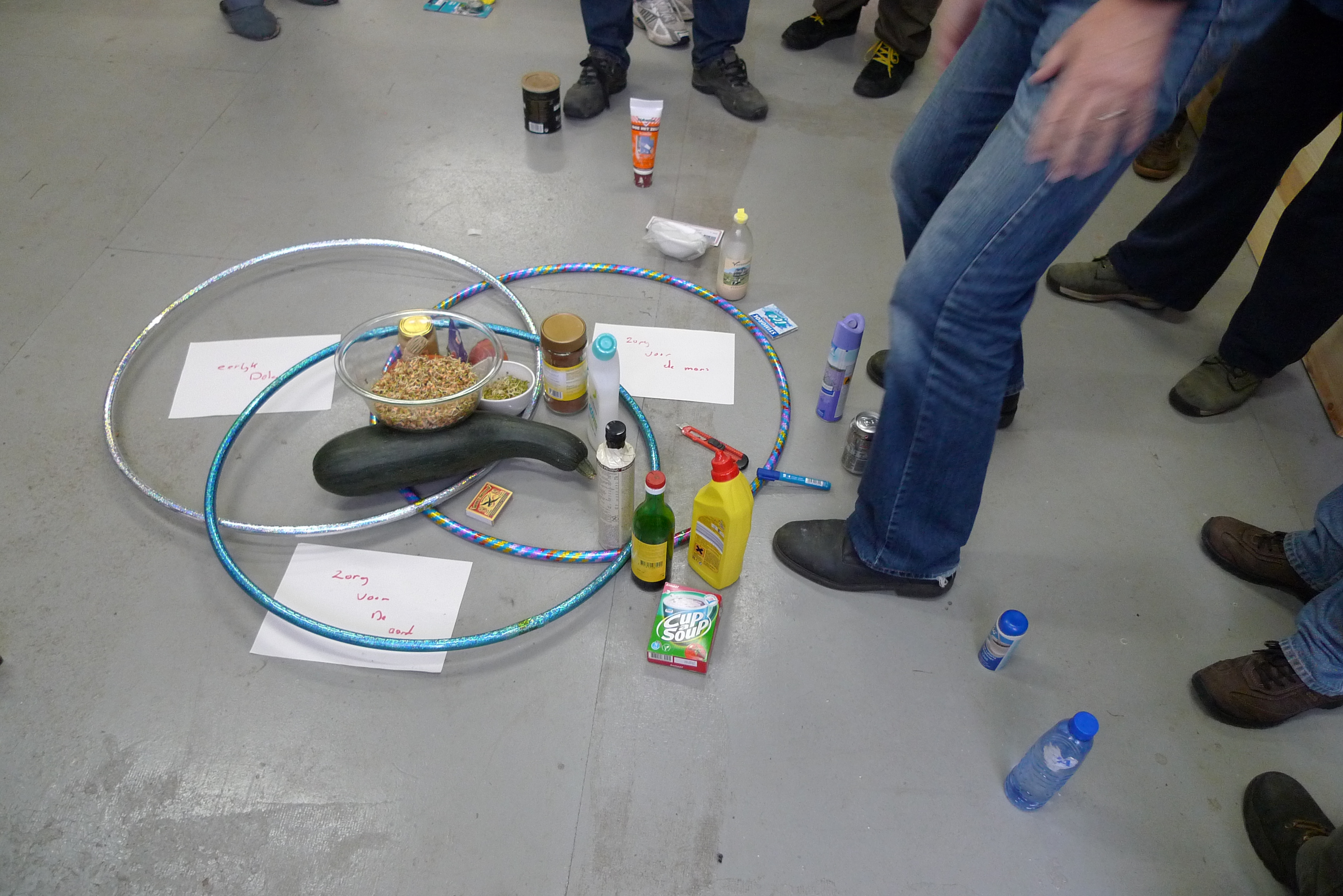 The 3 core values of permaculture captured in 3 hula hoops: Process and systems we set into action should: 1. care for the earth, 2. care for people, 3. be shared fairly