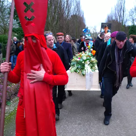Your friends take turns carrying your casket for more than a kilometer in the biting bitter cold, chanting and singing songs.