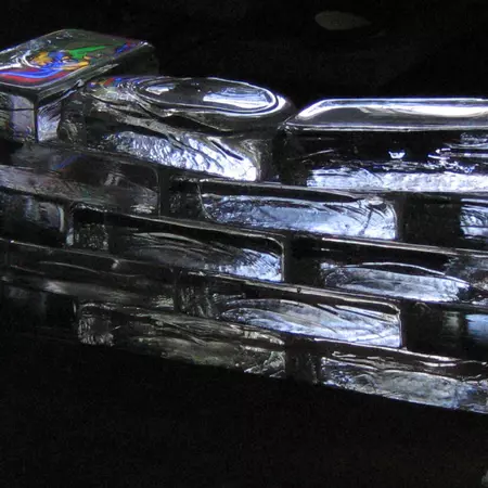 Cords in transparent building blocks allow light to pass while view is hindered Cords in transparent building blocks allow light to pass while view is hindered