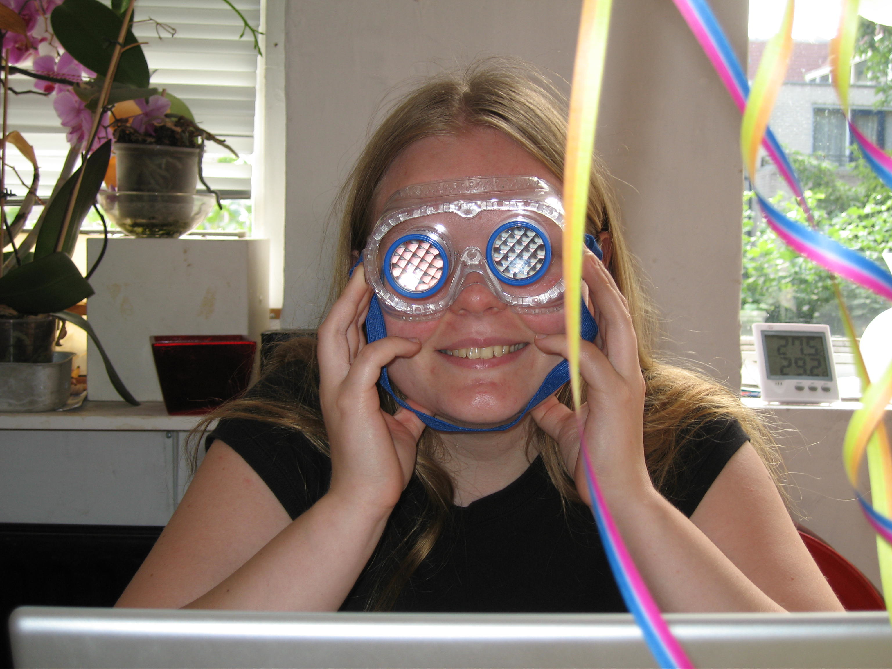 My daughter teasing me on my birthday: One candle on the cake+these googles=See how old you are Mum!