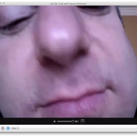 My brother Aaron is imitating the way my Dad looks for something on his desktop. Dad gets his nose shoved up real close to the screen, right up to the camera. In this shot Aar may have left some hummus on the corner of his mouth for dramatic effect.