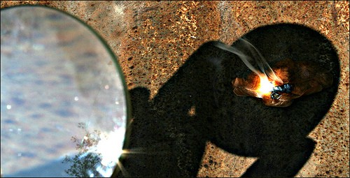 Burning with a magnifying glass