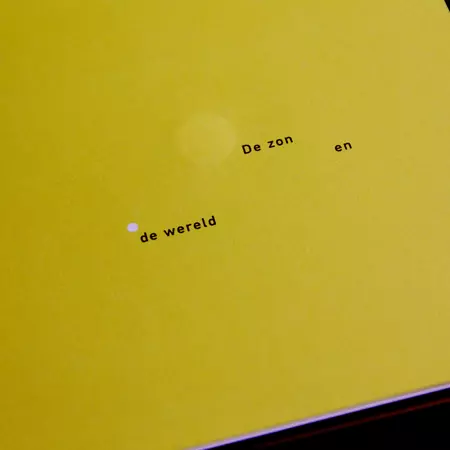 Chemical reaction of ink on paper being exposed to sunlight overtime.